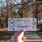 a woman holding a pass to the zoo