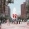 downtown area showing the popular LOVE sign and people walking